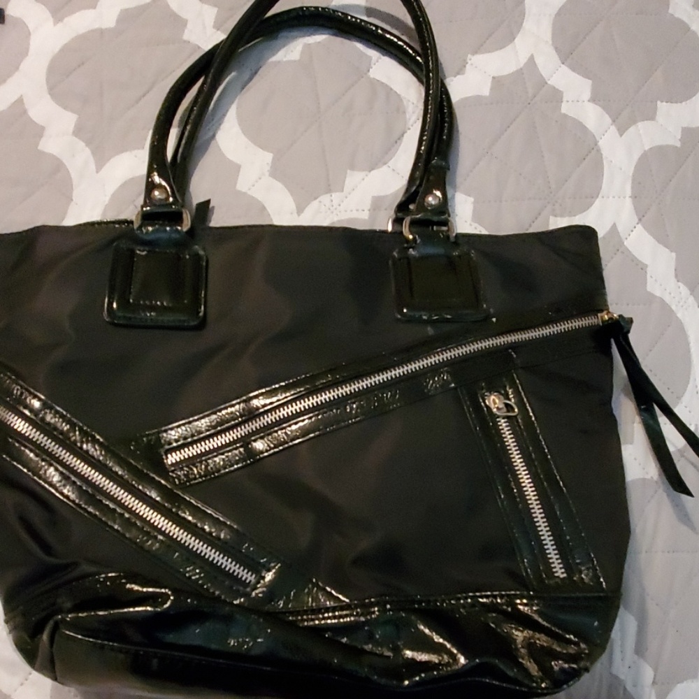 Carlos Santana purse